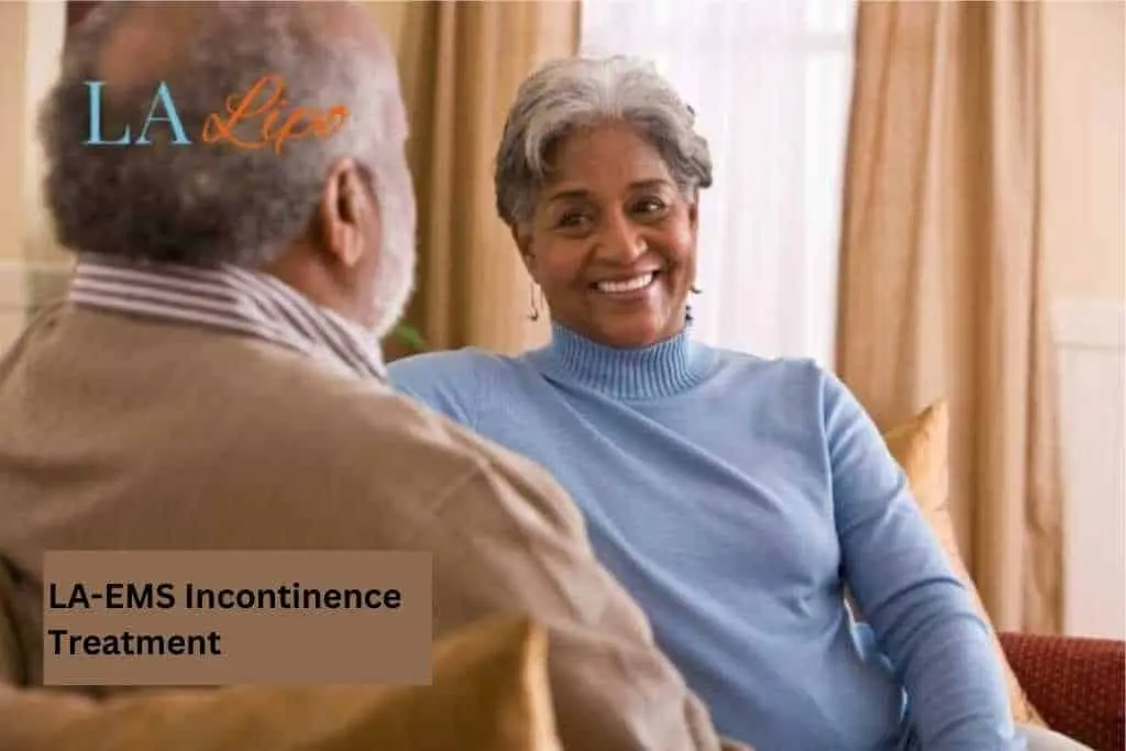 Couple sat smiling at each other - LA-EMS treatment Hammersmith