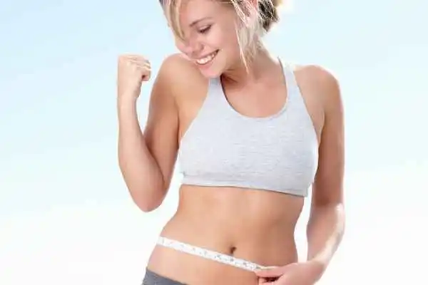 woman happy after fat reduction treatment Hammersmith